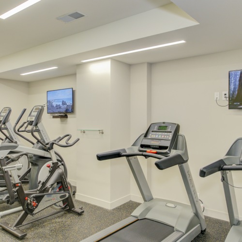 Fitness center, weights and mirror