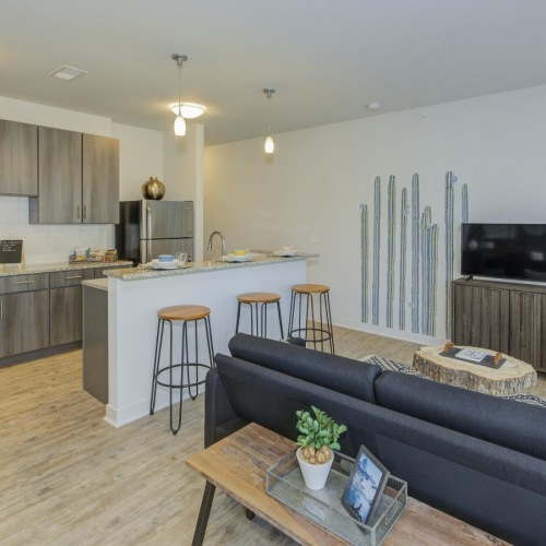 a living room with a couch and a table