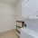 Washer and dryer with storage shelf
